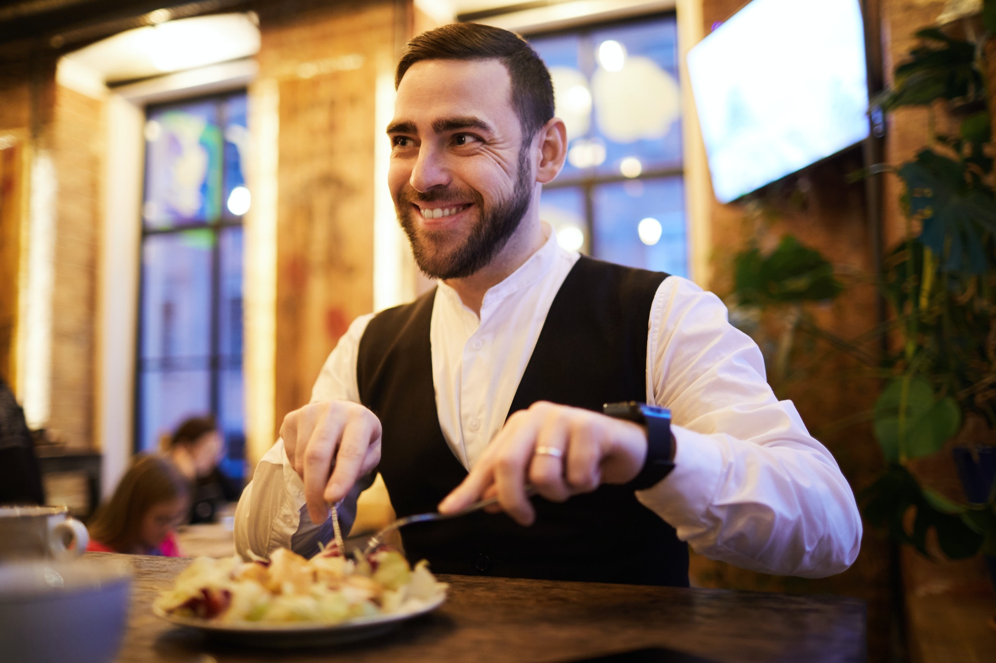 Businessman Eating Food n Restaurant