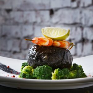 Modern restaurant food. Dorado fillet in nori with shrimps