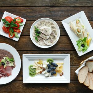 Restaurant food. Dishes served at wooden table